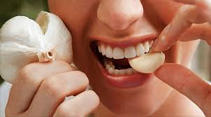 Garlic home remedies for teeth cavity.
