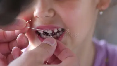 how to pull a tooth at home