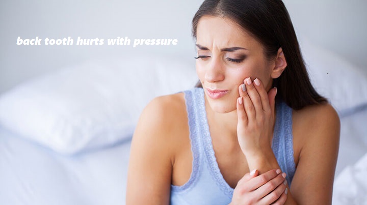 back tooth hurts with pressure