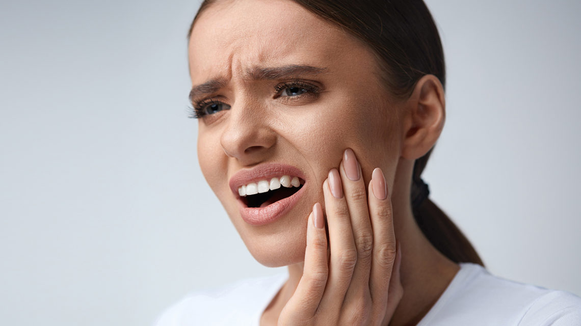tooth pain after root canal when biting