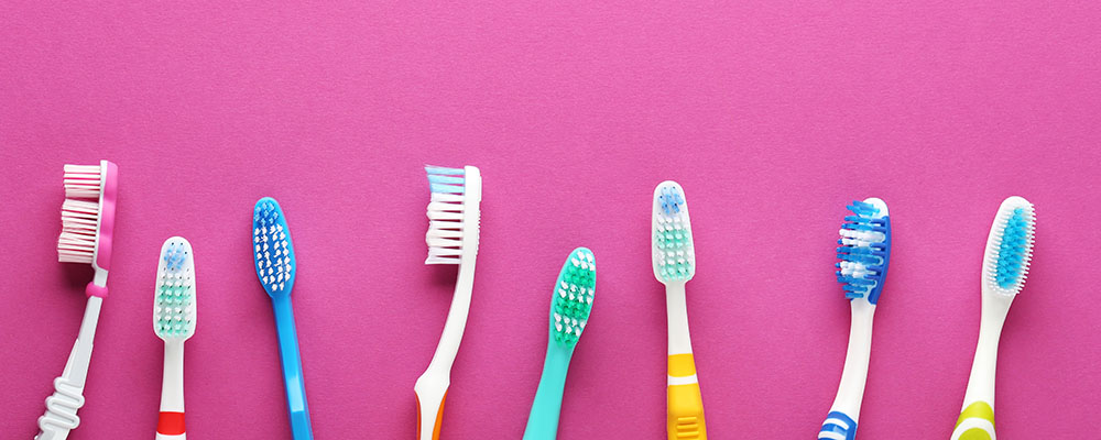 Toothbrushes with various styles of bristles arrangement on head